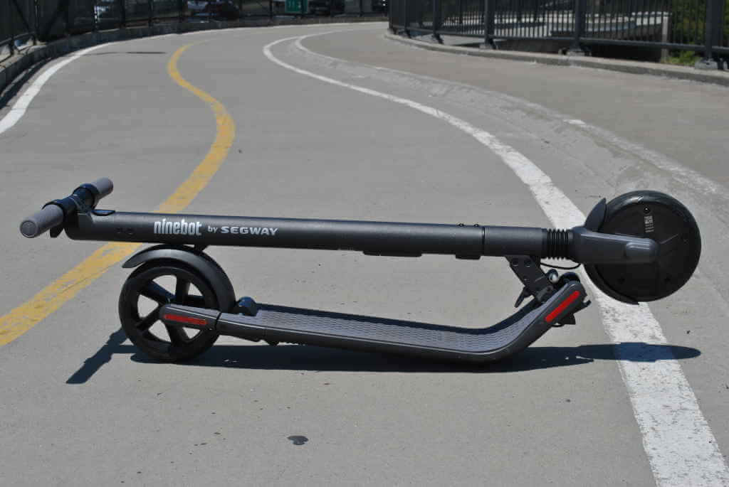 ES2 electric scooter folded on road