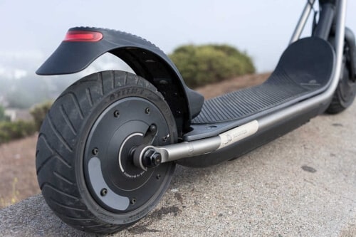 Boosted Rev rear foot brake and wheel