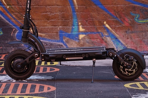 Shot of the lower half of a MiniMotors Dualtron Spider electric scooter