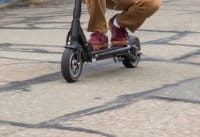 Man riding the Horizon electric scooter