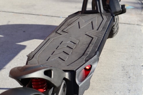 Rubberized electric scooter deck with Mantis logo