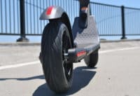 Close up of ES2 electric scooter front and rear tires
