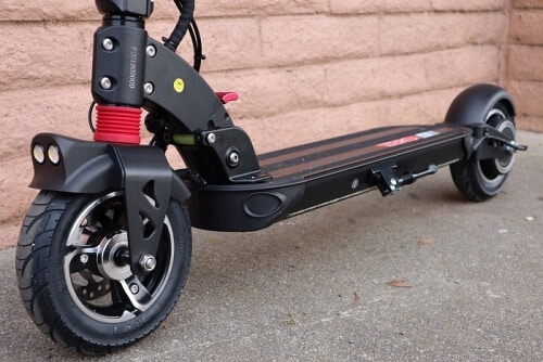 Lower half of an electric scooter showing tires and brakes