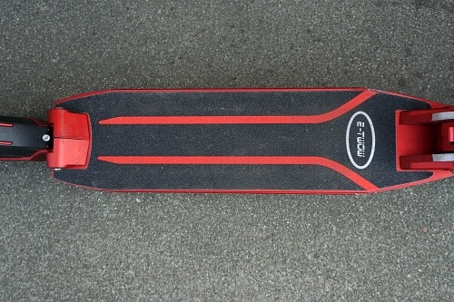Top down view of the UScooters Booster Sport deck covered with grip tape