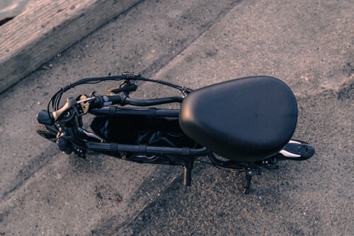 Fiido Q1S Seated Scooter - handlebars folded down, top view of seat and center compartment