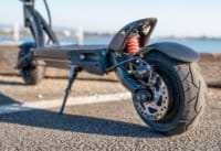 Kaabo-Mantis-8-electric-scooter-rear-view-low-angle-rear-tire-and-kickstand-and-deck