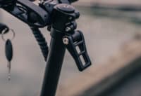 Apollo Ghost electric scooter - folding latch on stem, close-up