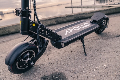 Apollo Ghost electric scooter - front wheel, fork, deck, kickstand, rear wheel, cropped view