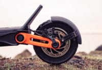 Inokim OXO Electric Scooter - rear wheel, hydraulic brake, pneumatic tire, single swingarm, fender, side view, close-up