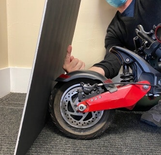 Zero 10X Electric Scooter - fender test, rear wheel, side view, cropped