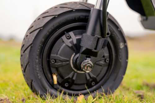 Kaabo Wolf King electric scooter - front hub motor, close-up, tire