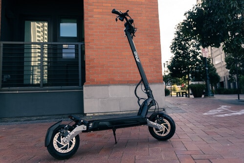 Apollo Phantom electric scooter- scooter, full, brick walkway