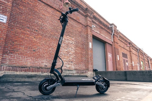 Apollo Phantom electric scooter - scooter, full, brick wall