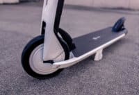 Segway Ninebot Air T15 electric scooter - front of scooter, front wheel, deck, kickstand, cropped view
