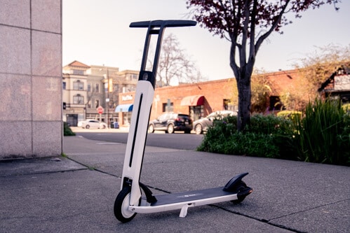 Segway Ninebot Air T15 electric scooter - full scooter, stem to left, tree in background