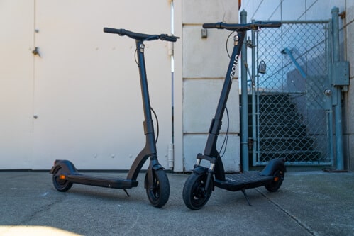 Apollo Air electric scooter (left) and Apollo Air Pro electric scooter (right) facing one another 