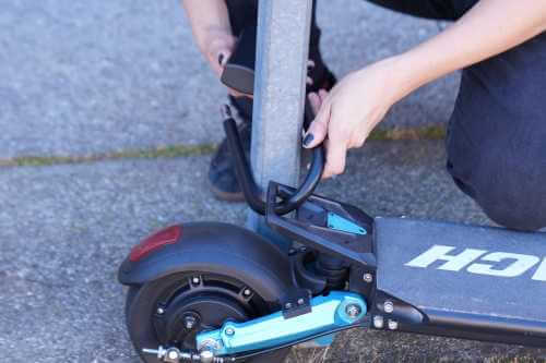Splach Turbo electric scooter - locked to pole