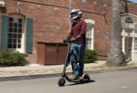 Segway Ninebot ES4 electric scooter - man riding scooter