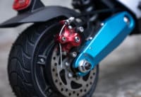 Close up of Pegasus electric scooter brakes and tires