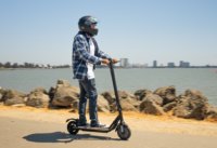 Man riding CityRider electric scooter