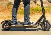 Close up of rider's feet on a CityRider electric scooter