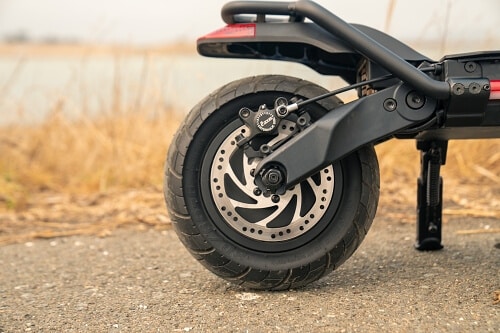Close up of Warrior X rear disc brake and wheel